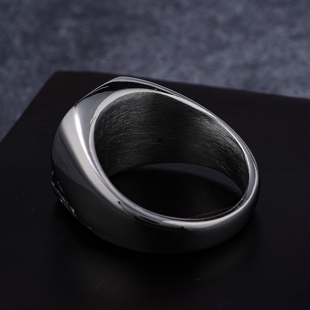 Inner and side view of polished stainless steel signet ring