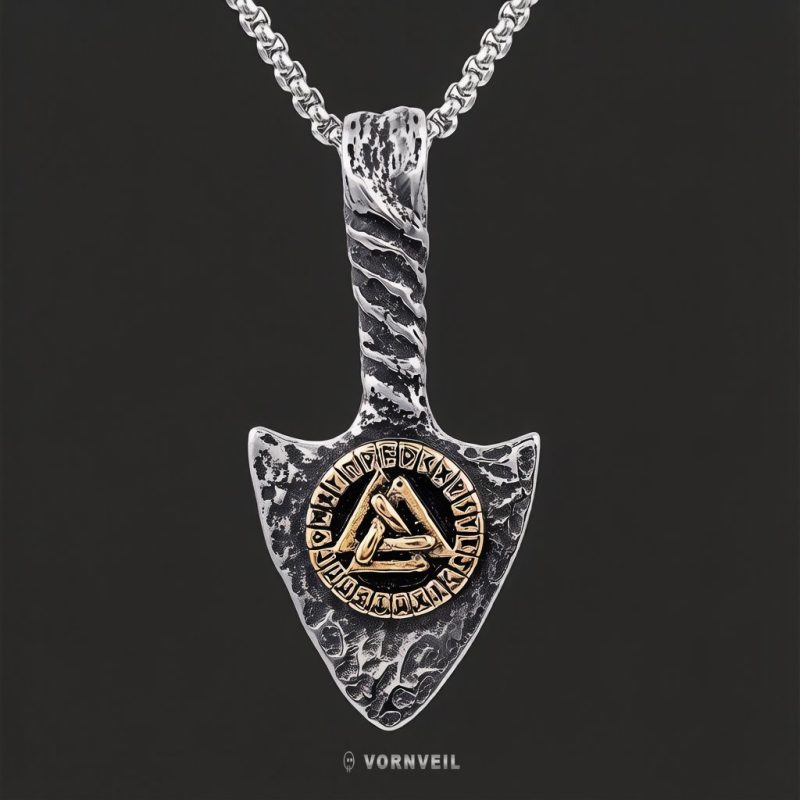 Vornveil Viking rune arrowhead stainless steel pendant necklace on a dark background with silver logo watermark