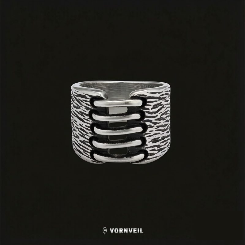 Vornveil distressed steel pinky band ring with silver logo watermark